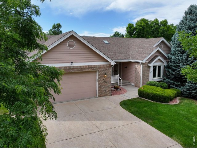 Property Photo 6 This home offers an oversized 2 car garage and there is a large workspace and shop area in the basement. 
