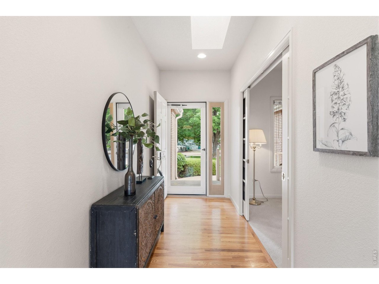 The light pours into this home and welcomes you in. 