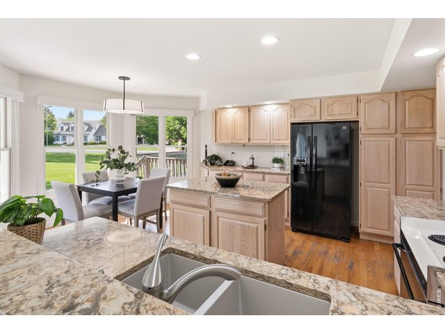 Property Photo 17 The large kitchen has a breakfast nook and a center island. 