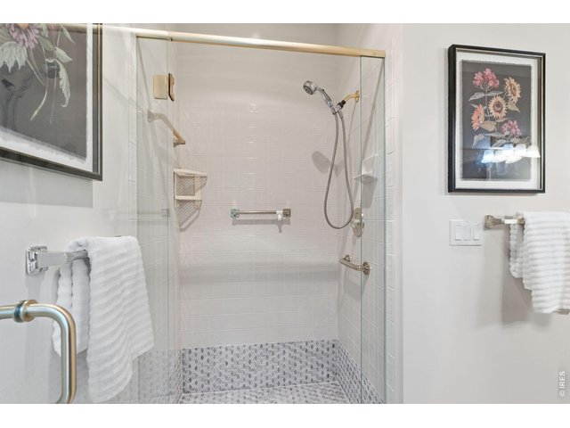 Property Photo 27 Convenient well designed zero entry shower. 