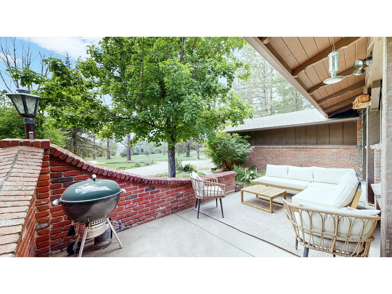 Property Photo 21 Out door living on partial covered patio. 