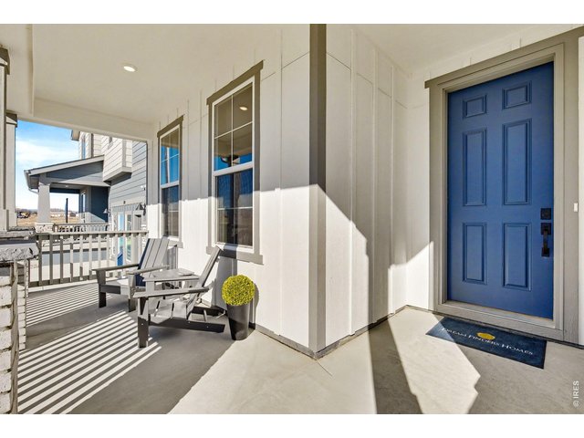 Property Photo 3 Covered front patio - Model Home