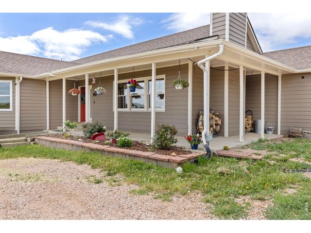 Property Photo 5 Inviting covered front porch.