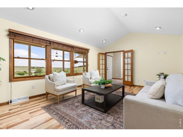 Property Photo 10 New 3/4-inch hickory hardwood floors add warmth and character.