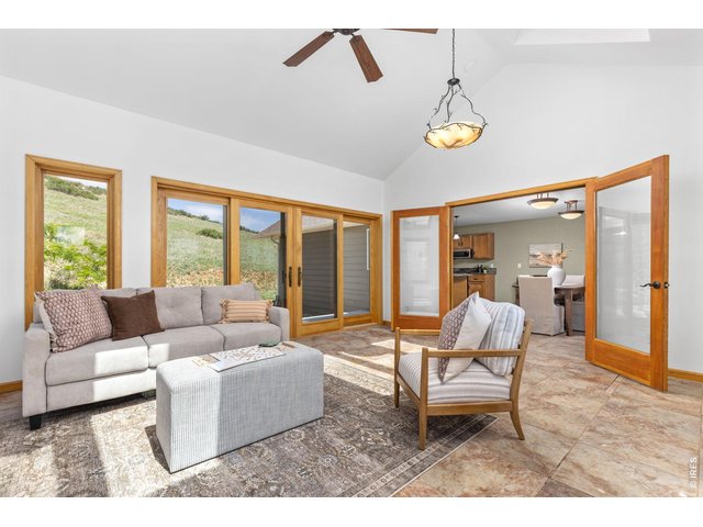 Property Photo 15 The Sunroom - Filled with natural light and warmed by its own propane stove.