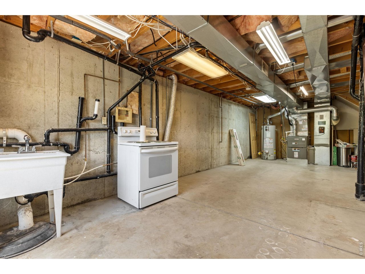 Property Photo 32 Utility & Storage Area - Home to the laundry area, mechanical systems, and additional storage space.