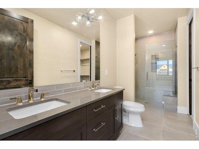 Property Photo 22 Wonderful, zero threshold walk -in Shower in Primary En-Suite