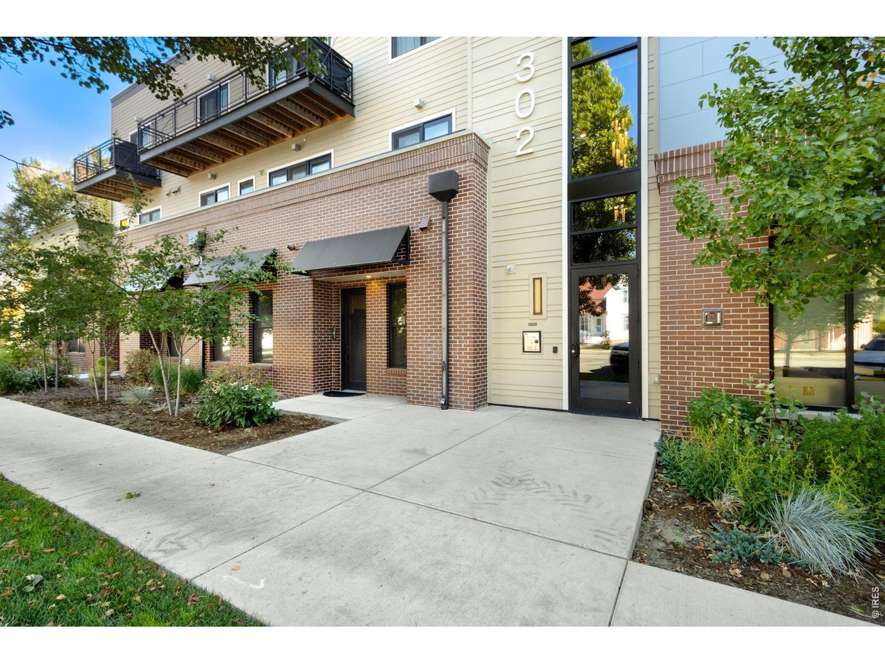 Property Photo 3 Main Entry on Westside. Electronic keypad or fob entry only