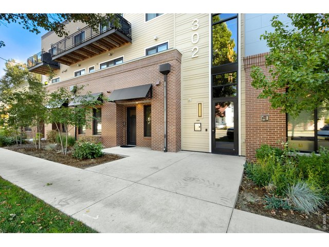 Property Photo 3 Main Entry on Westside. Electronic keypad or fob entry only
