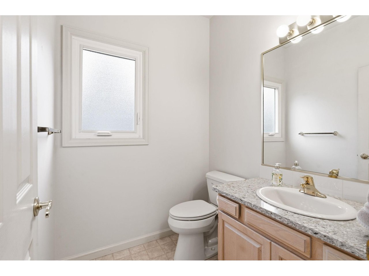 Powder bath on main level off the laundry area. 