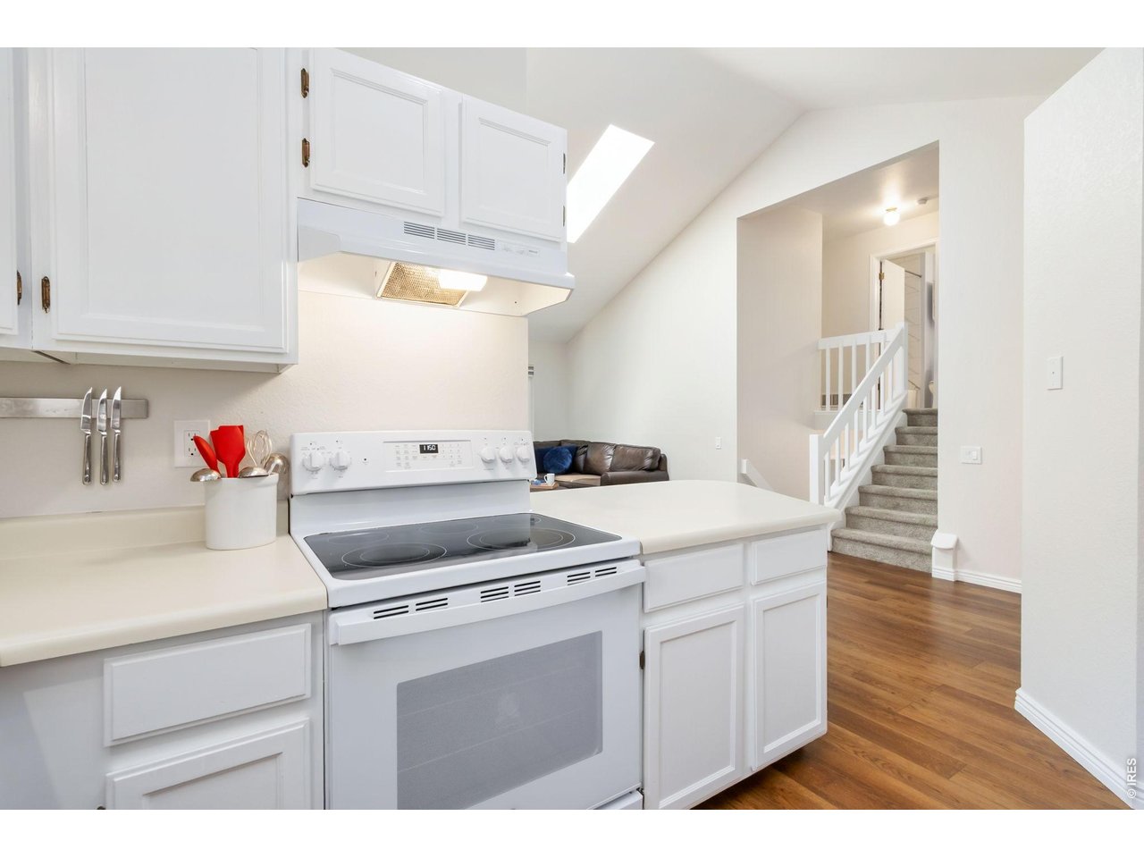 Property Photo 10 Open to the main living areas, this bright kitchen keeps everyone connected while entertaining or preparing meals.