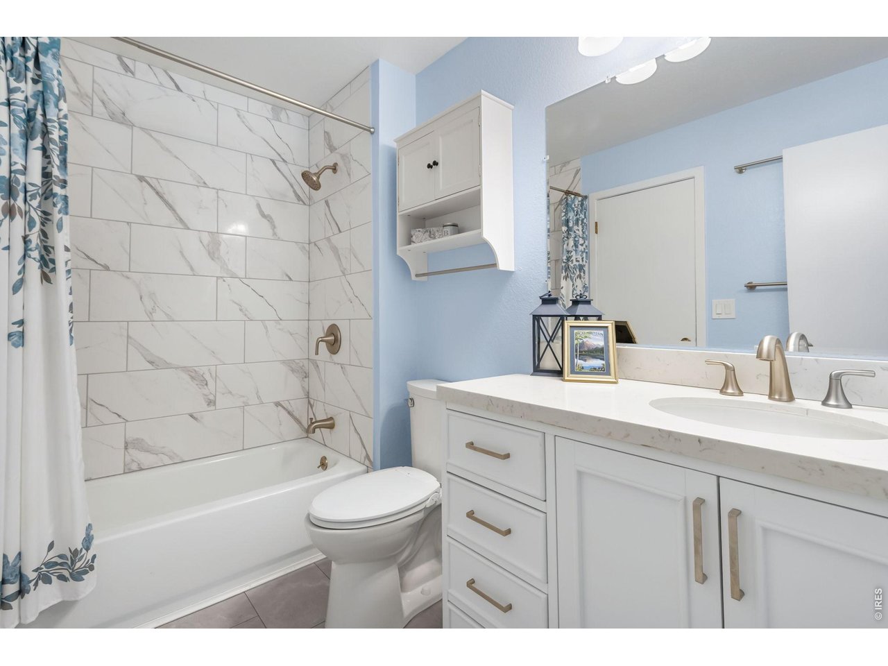 Property Photo 15 Enjoy the fresh, updated feel of this beautifully remodeled bathroom with stylish finishes and thoughtful design.