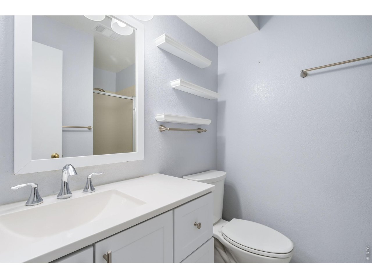 Property Photo 20 Downstairs bathroom with shower.