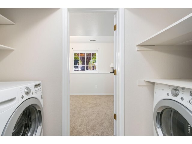 Property Photo 19 Convenient laundry space with additional storage to help keep daily routines organized.