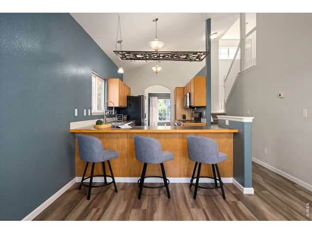 Property Photo 11 The peninsula offers extra counter space and is great for entertaining