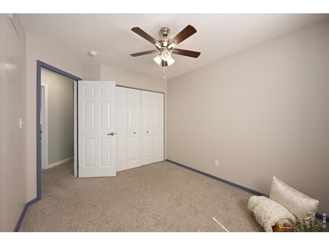 Property Photo 22 Bedroom #2 - recenty painted and new fan with remote