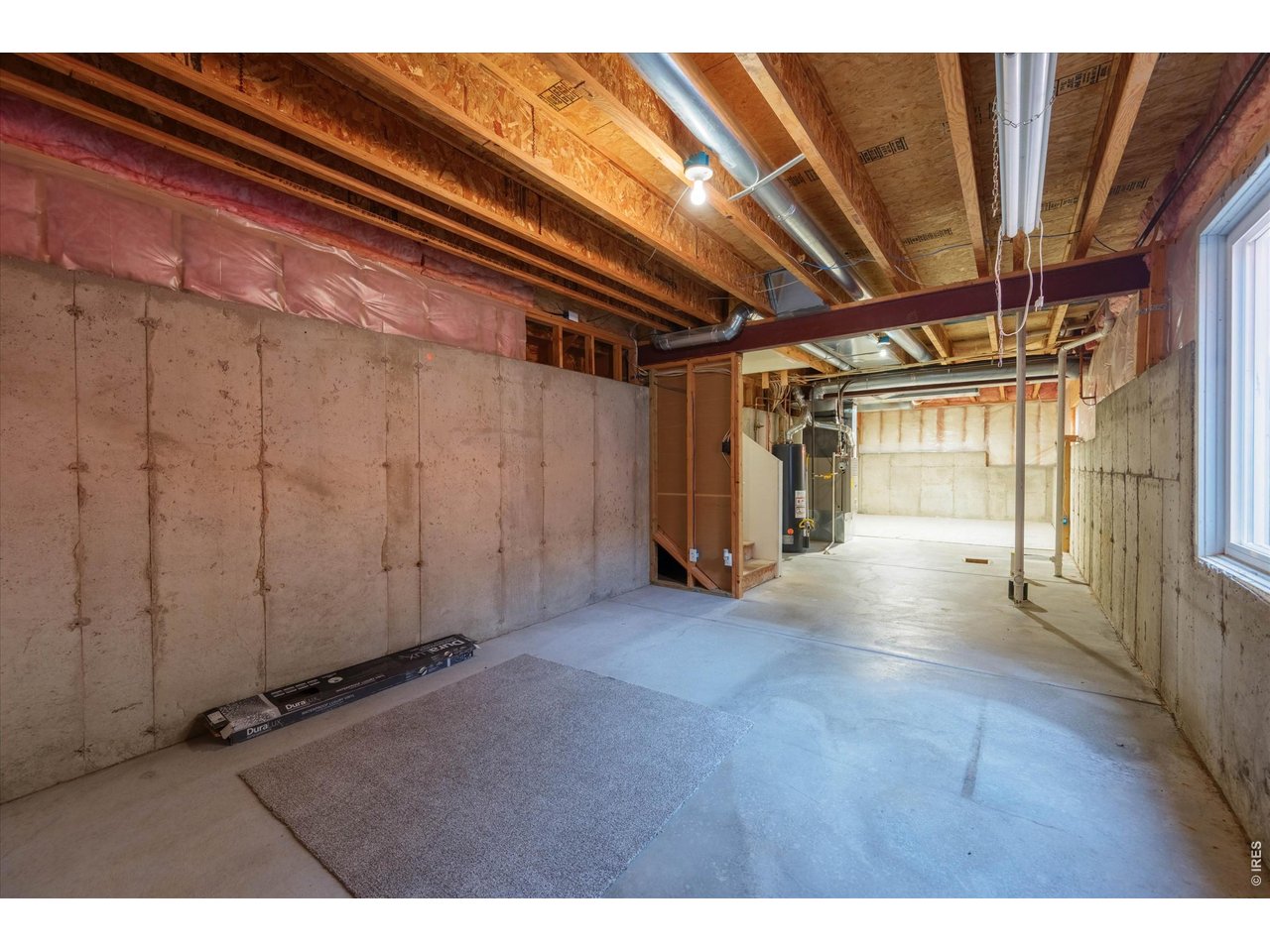Unfinished Basement with garden level windows and rough-in bathroom
