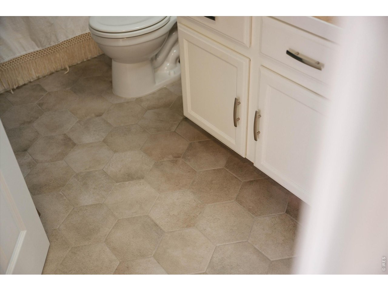 All upstairs bathrooms have contemporary tile