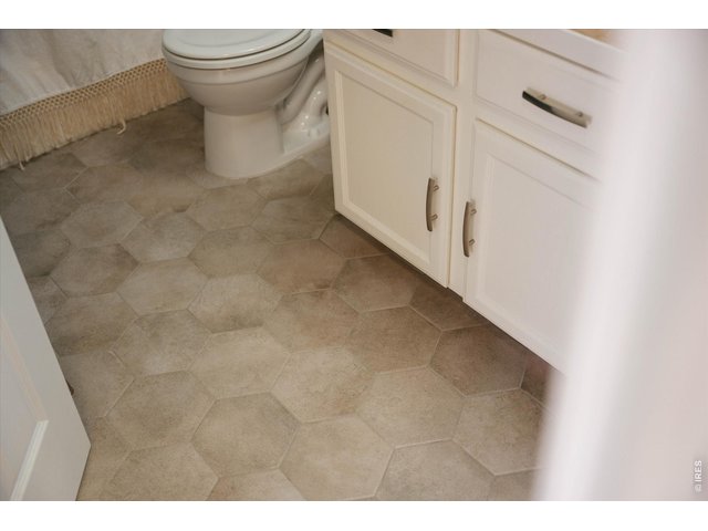 Property Photo 32 All upstairs bathrooms have contemporary tile