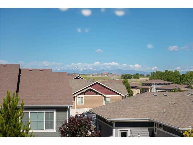 Property Photo 19 Mountain Views - see Longs Peak from the primary bedroom 