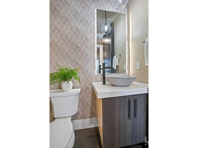 Property Photo 9 Powder Room with designer finishes off kitchen