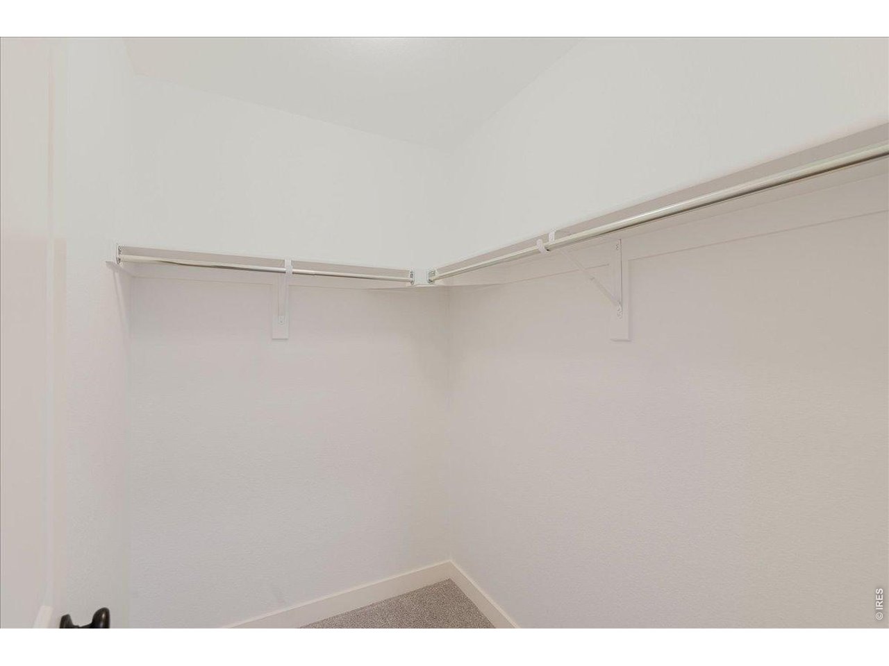 The 2nd closet in the primary bedroom is off the hall to the en suite