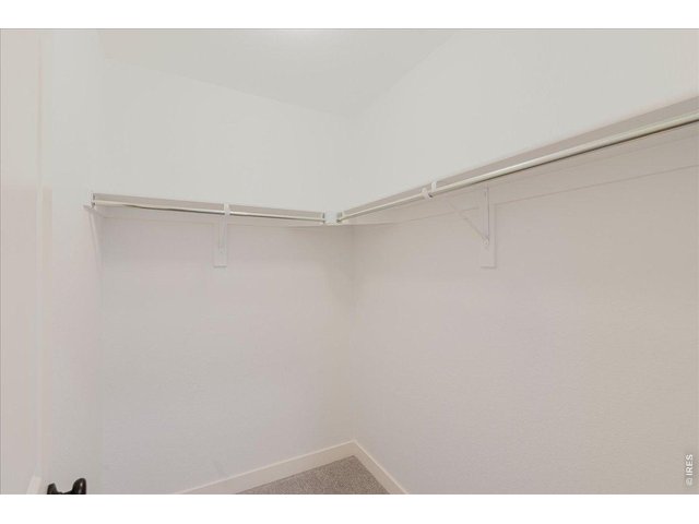 Property Photo 22 The 2nd closet in the primary bedroom is off the hall to the en suite