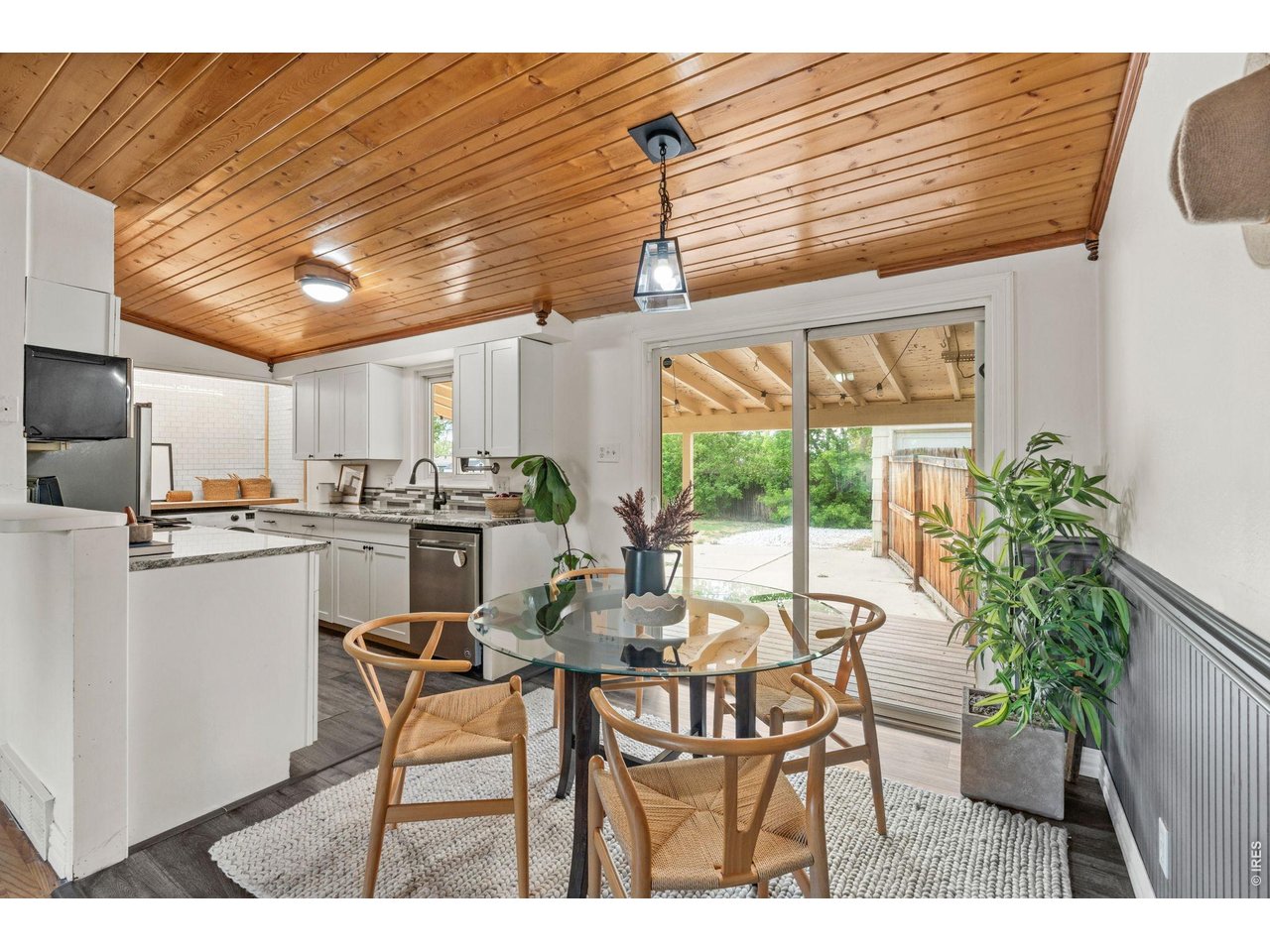 Original hardwood floors run throughout the main living areas, lovingly preserved character.