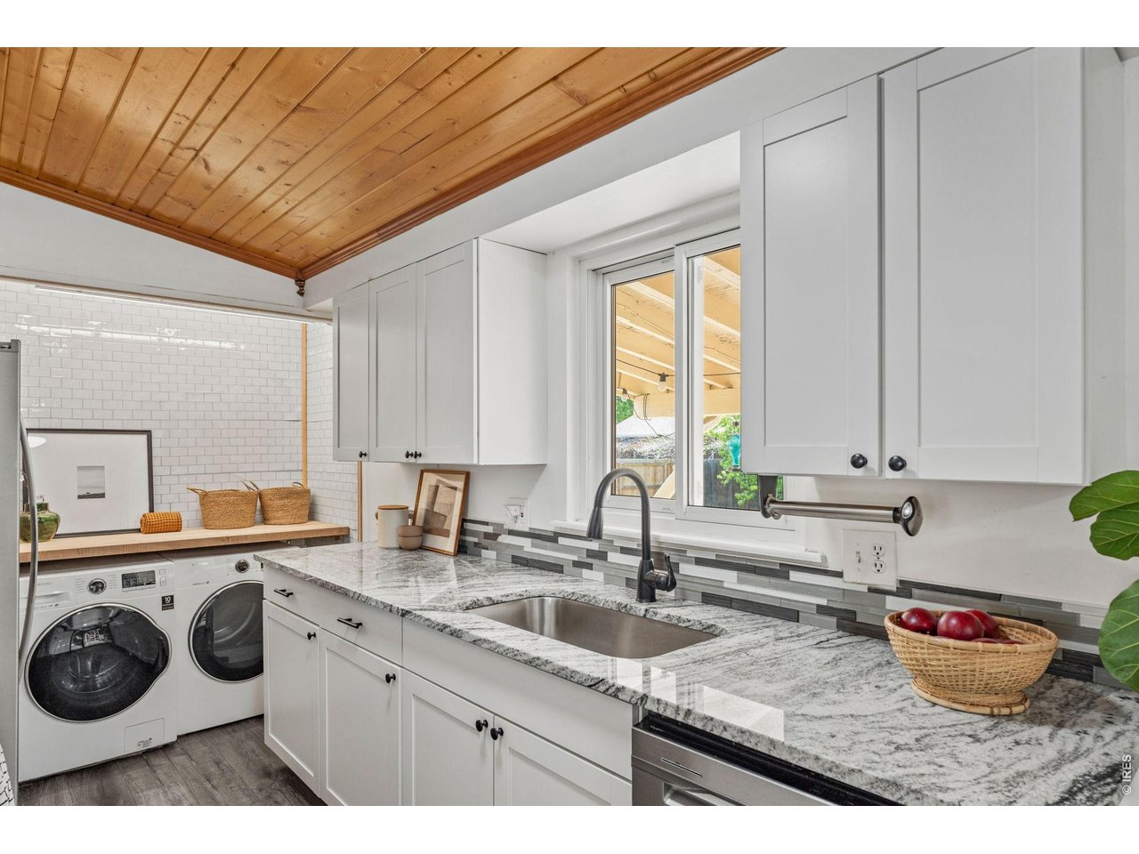 The kitchen is the heart of the home with thoughtful storage and timeless finishes.