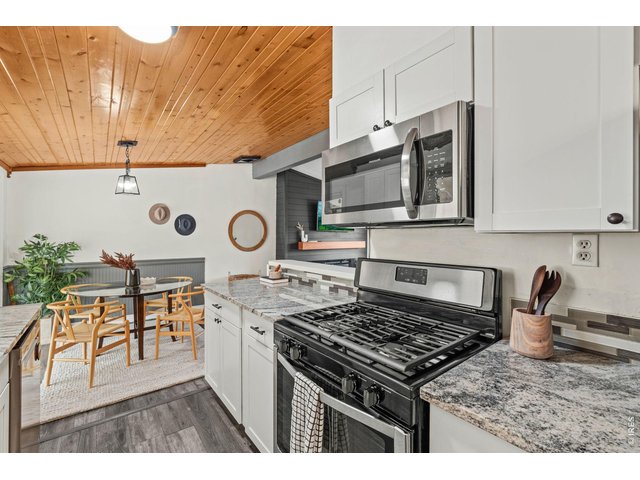 Property Photo 15 Wood plank ceiling adds warmth and architectural interest you simply cannot replicate.