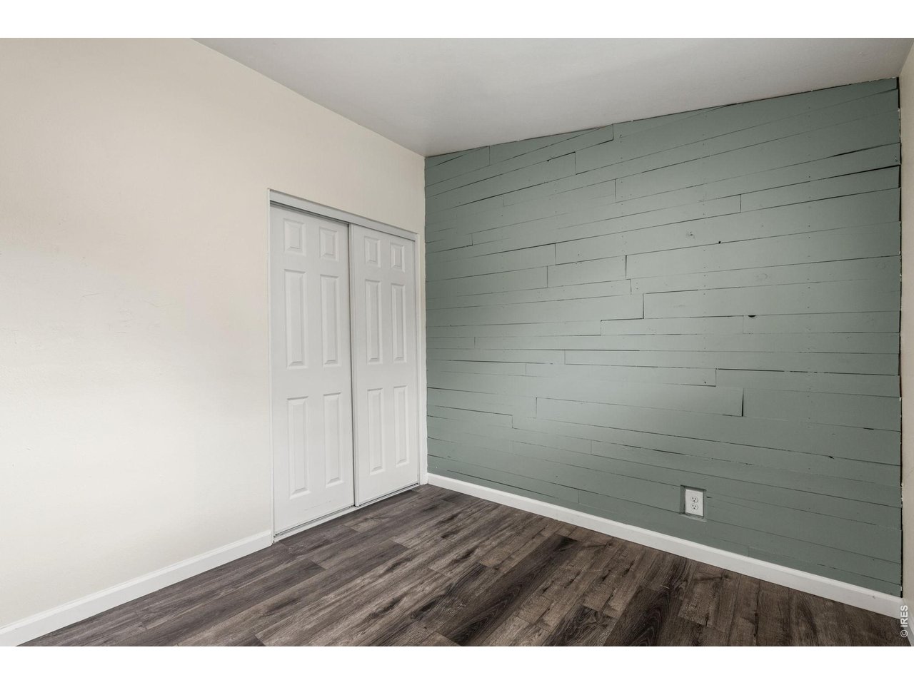 Custom shiplap detail adds character and texture to this versatile space.