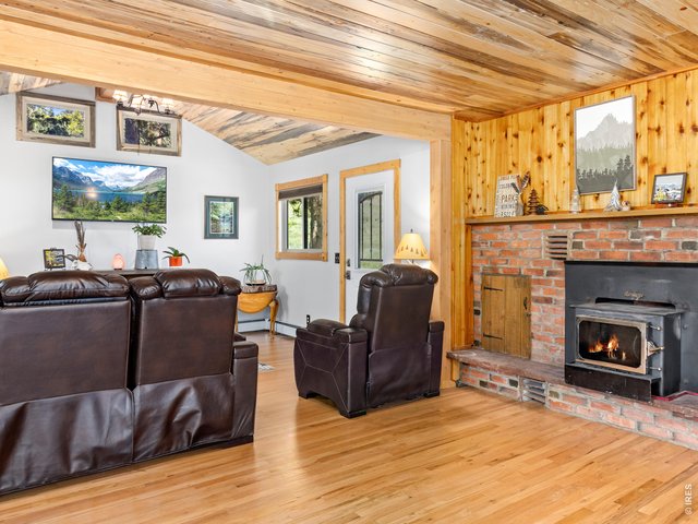 Property Photo 9 Wood burning fireplace