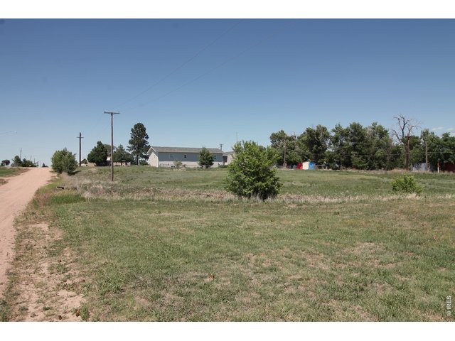 Property Photo 4 View from the southwest corner of the 1 acre lot