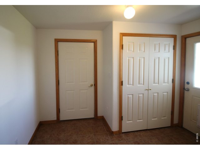 Property Photo 14 Mudroom area off the kitchen to the garage and back yard