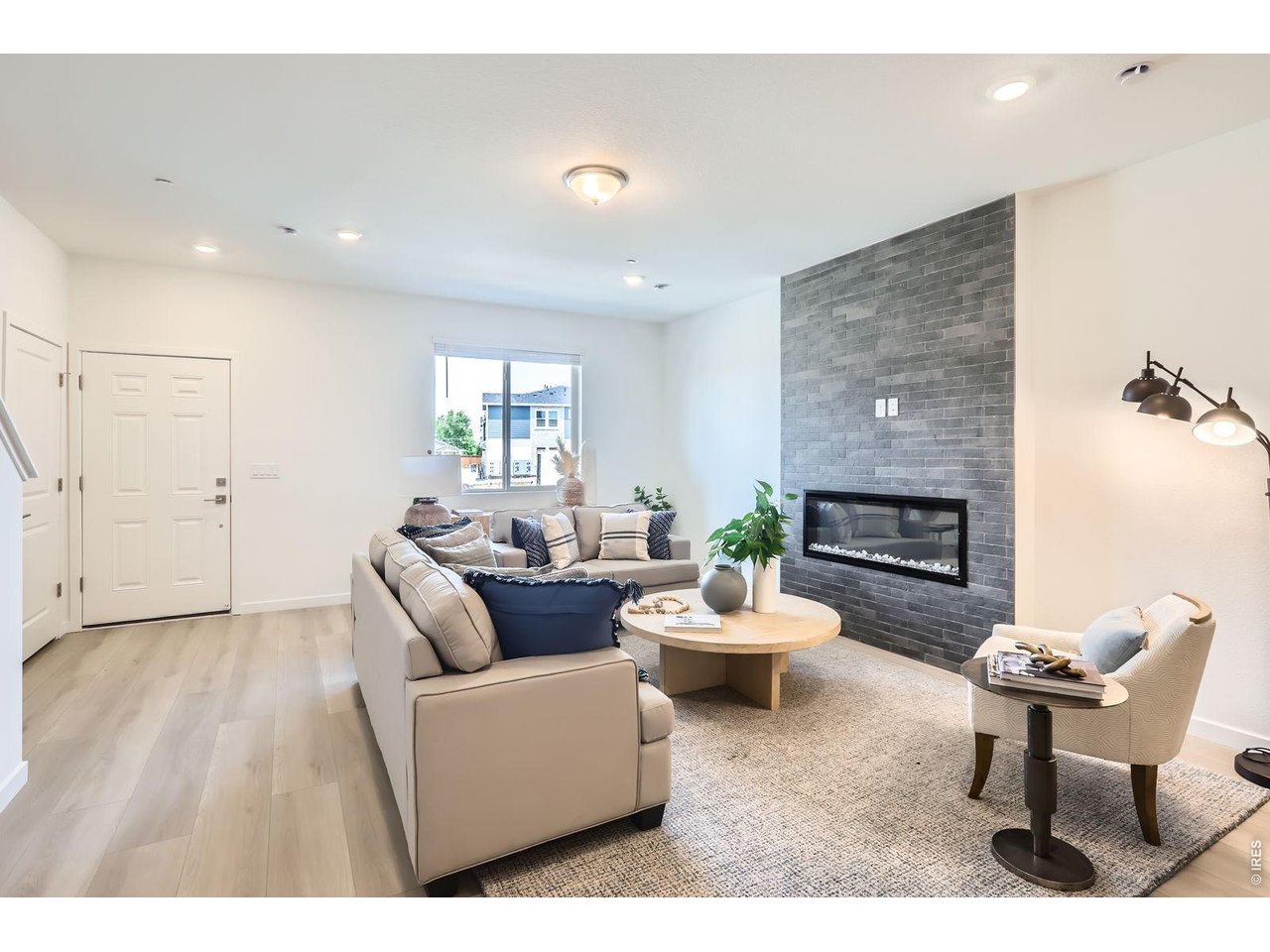 Centered by electric fireplace - Model Home