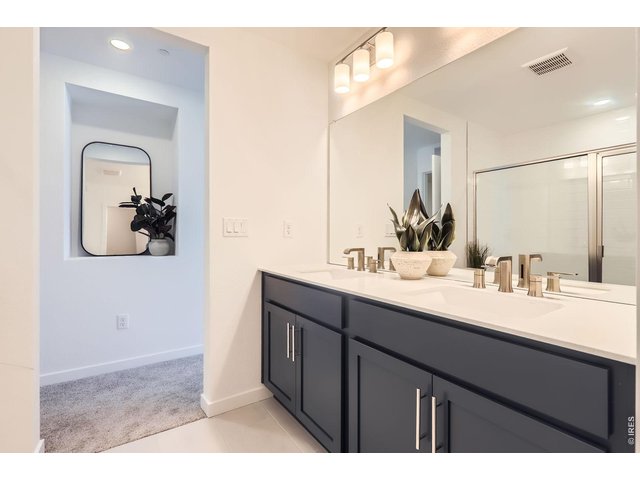 Property Photo 20 Dual vanities - Model Home