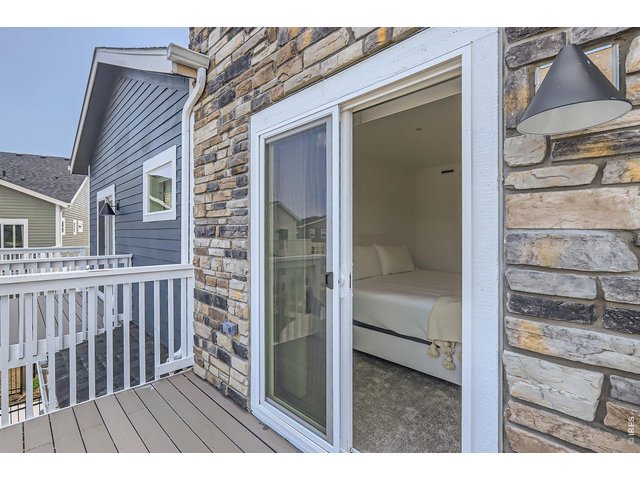 Property Photo 28 Primary balcony - Model Home