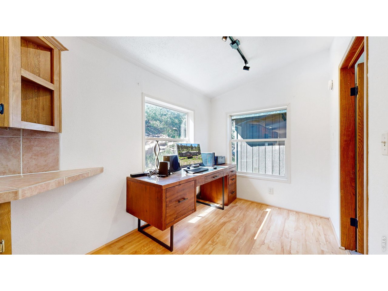 Property Photo 17 area off the kitchen used as an office, but would make a great drop zone/mudroom area or eating nook