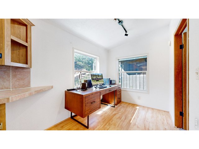 Property Photo 17 area off the kitchen used as an office, but would make a great drop zone/mudroom area or eating nook