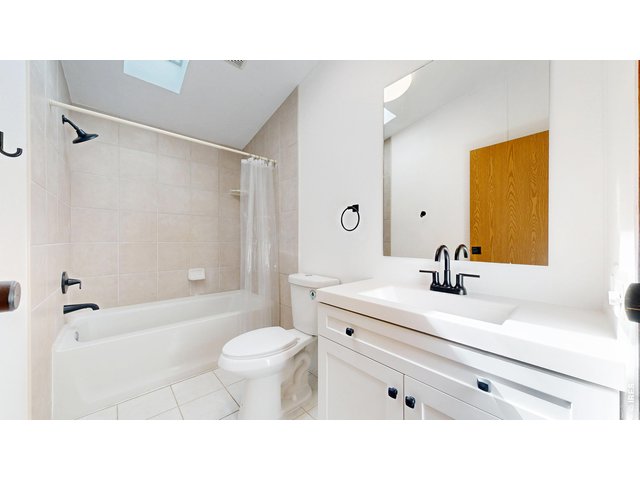 Property Photo 28 Main bathroom remodeled
