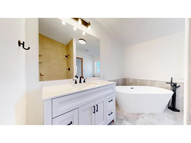 Property Photo 23 Remodeled primary bathroom