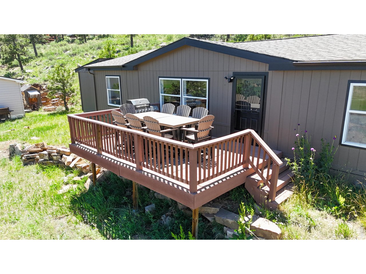 Property Photo 3 New front porch faces East, making a great area to sit and take in the mountain air watching the sunrise. 