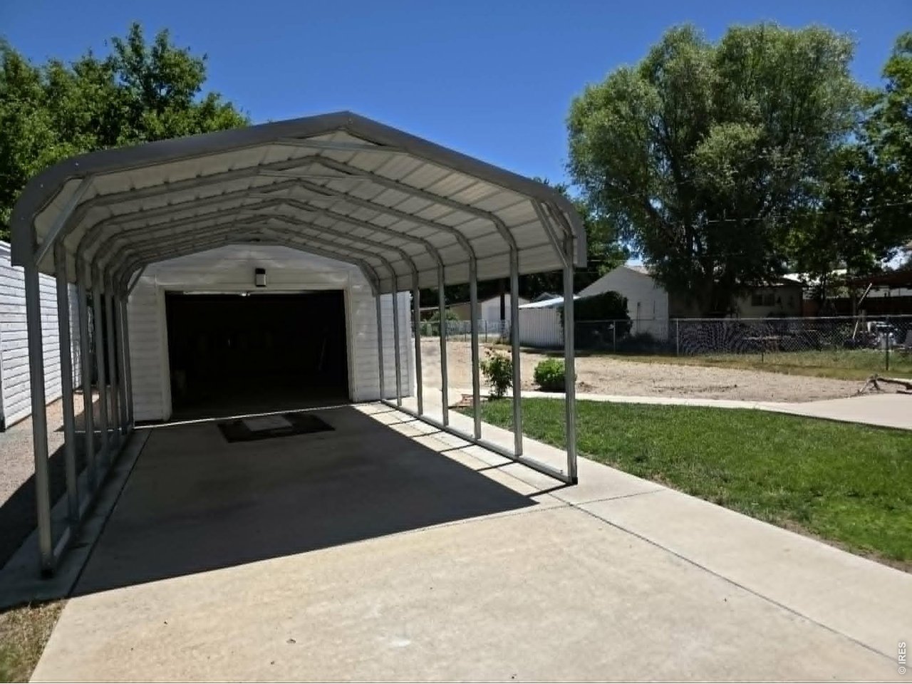 Single car garage with carport