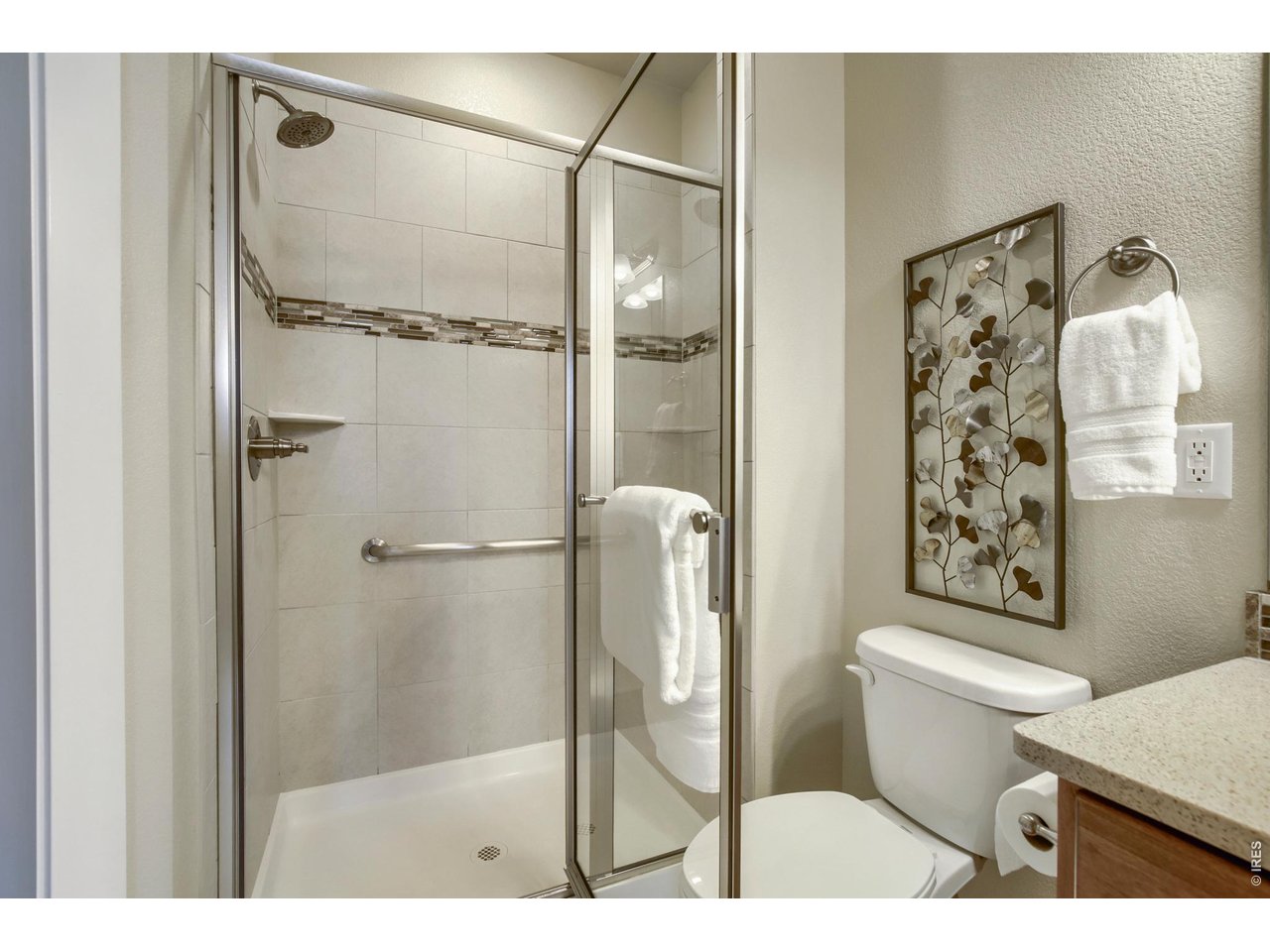 Property Photo 19 Primary Shower w/ built-in shower bench