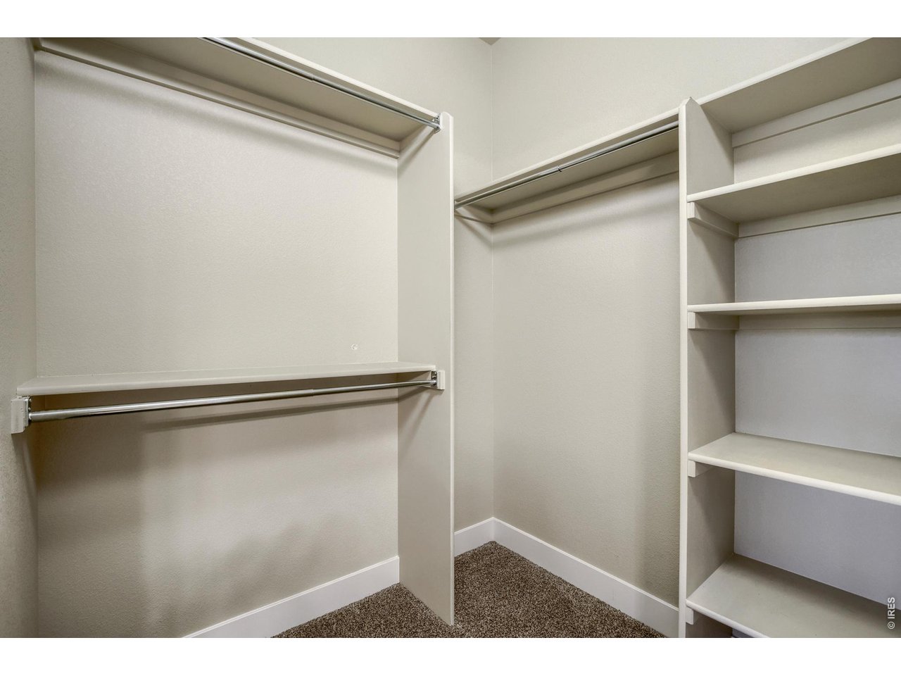 Property Photo 17 Primary Suite walk-in closet