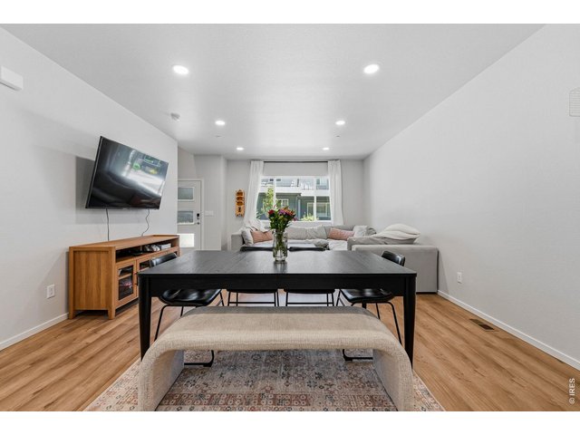 Property Photo 9 Luxury vinyl plank flooring extends throughout the main level