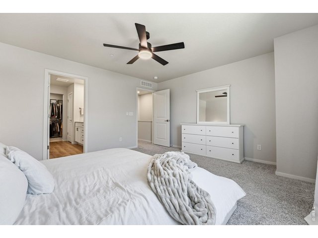 Property Photo 20 Primary suite offers a walk-in closet and private bath
