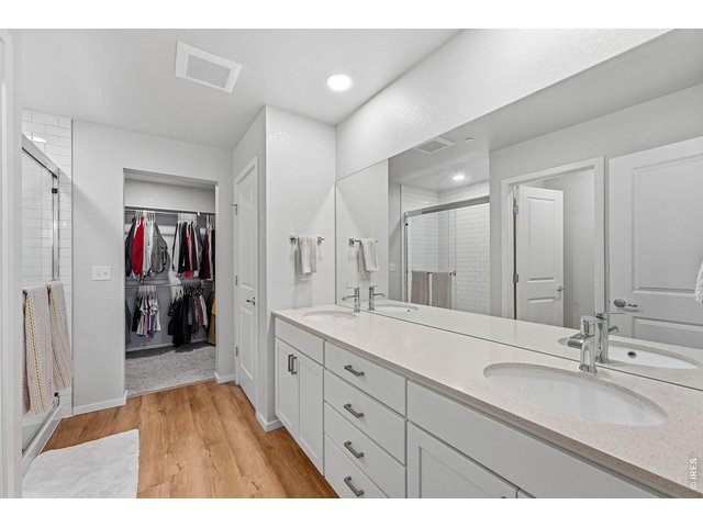Property Photo 22 Primary suite offers a walk-in closet and private bath