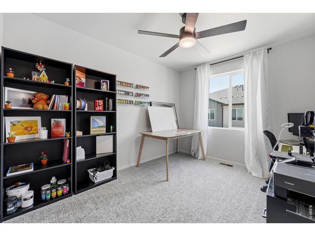 Property Photo 26 Two additional bedrooms feature walk-in closets and share a full bath