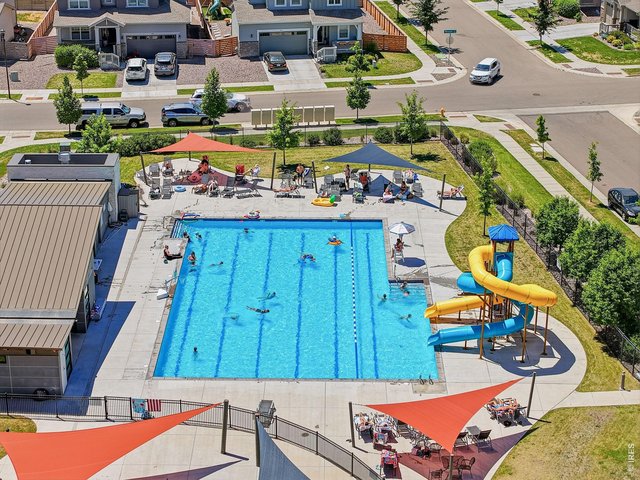 Property Photo 33 Enjoy resort style amenities including two pools, a hot tub, playgrounds, trails, community BBQ areas, abundant green space, and a 20 acre park